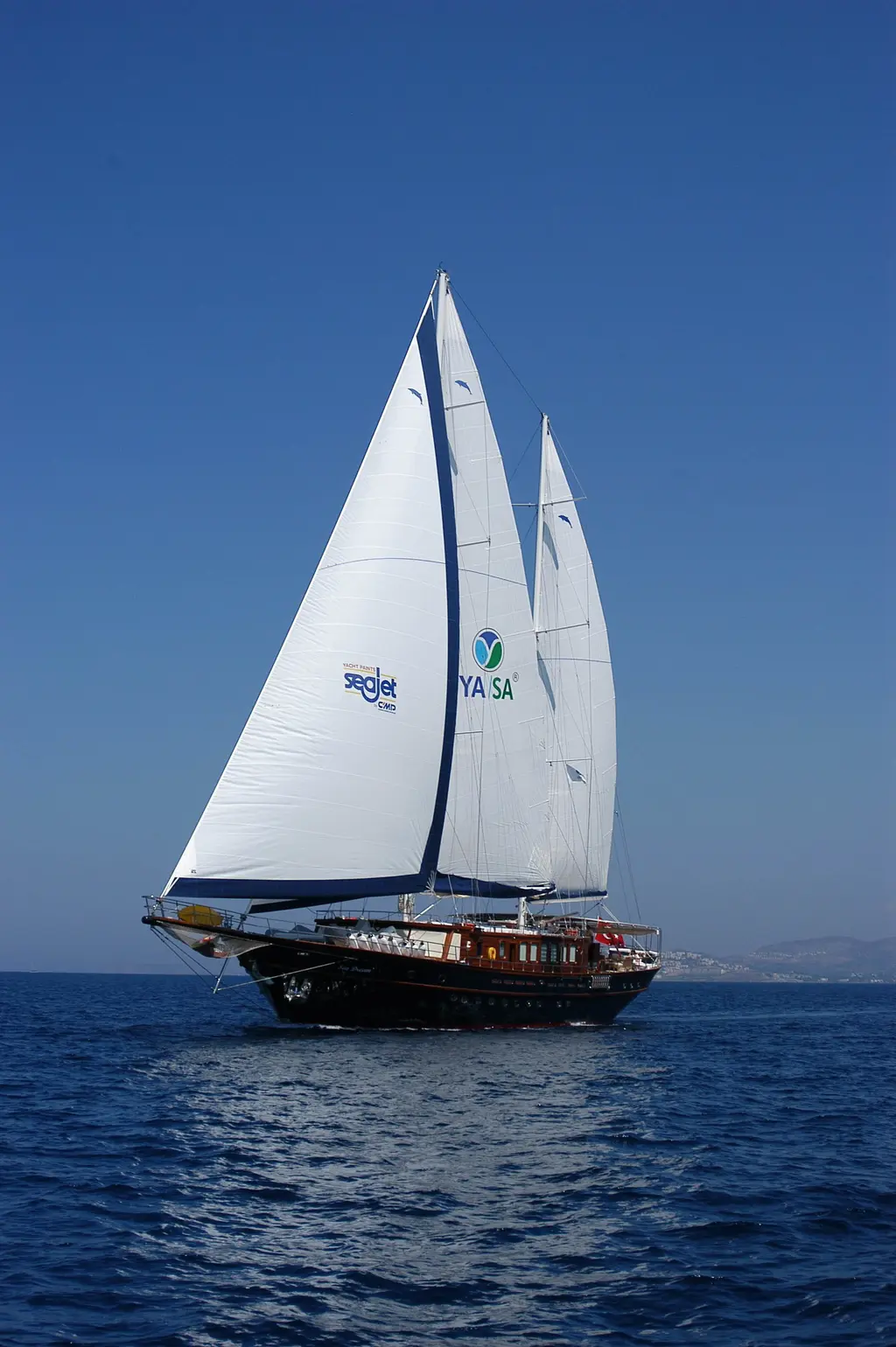 Sea Dream sailing towards the camera, sails filled