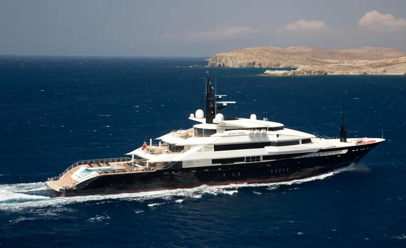Alfa Nero underway from the bow to the pool on her aft deck, an island behind