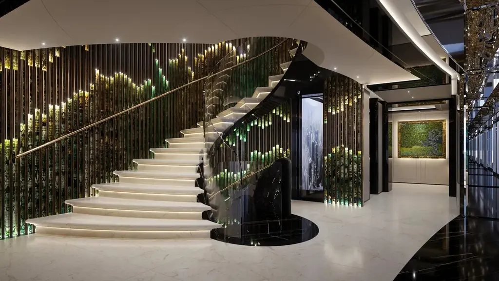 Curved staircase with backlit green panels