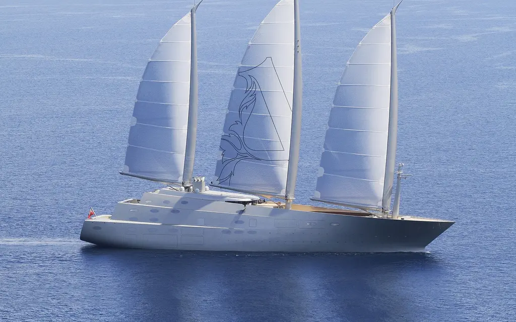 Sailing Yacht A under full sail in profile on a calm blue sea, three white sails set on curved masts