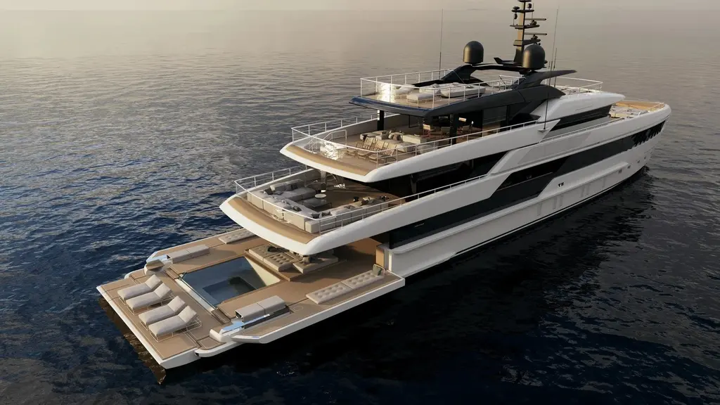 Aerial view of the stern of the 50Steel with the beach club open: side terraces folded down, a small pool and sun loungers at water level