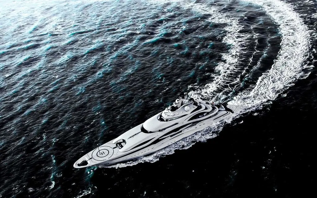 Aerial view of Al Lusail turning at speed, with the helipad marked on the foredeck