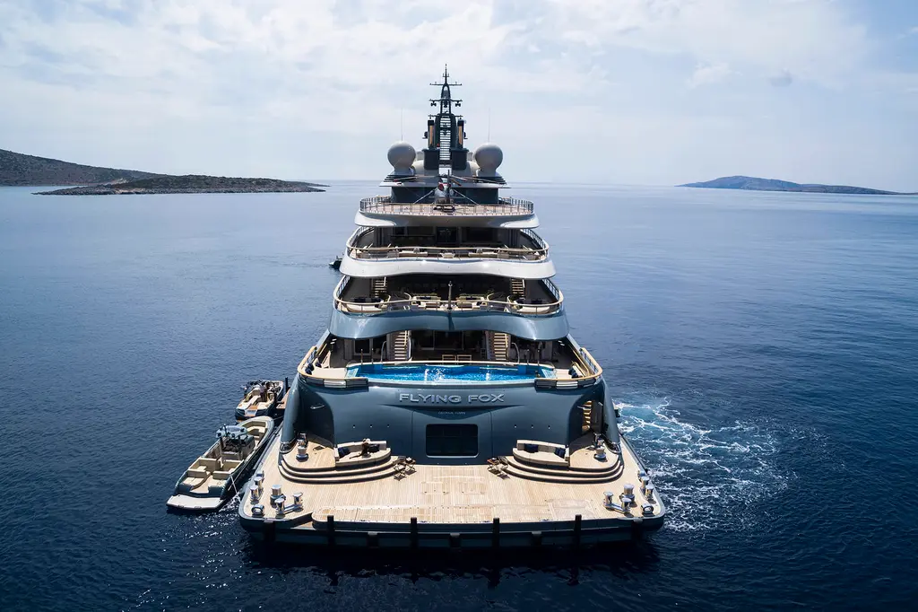 Stern view of Flying Fox with the pool on the aft main deck and the swim platform lowered