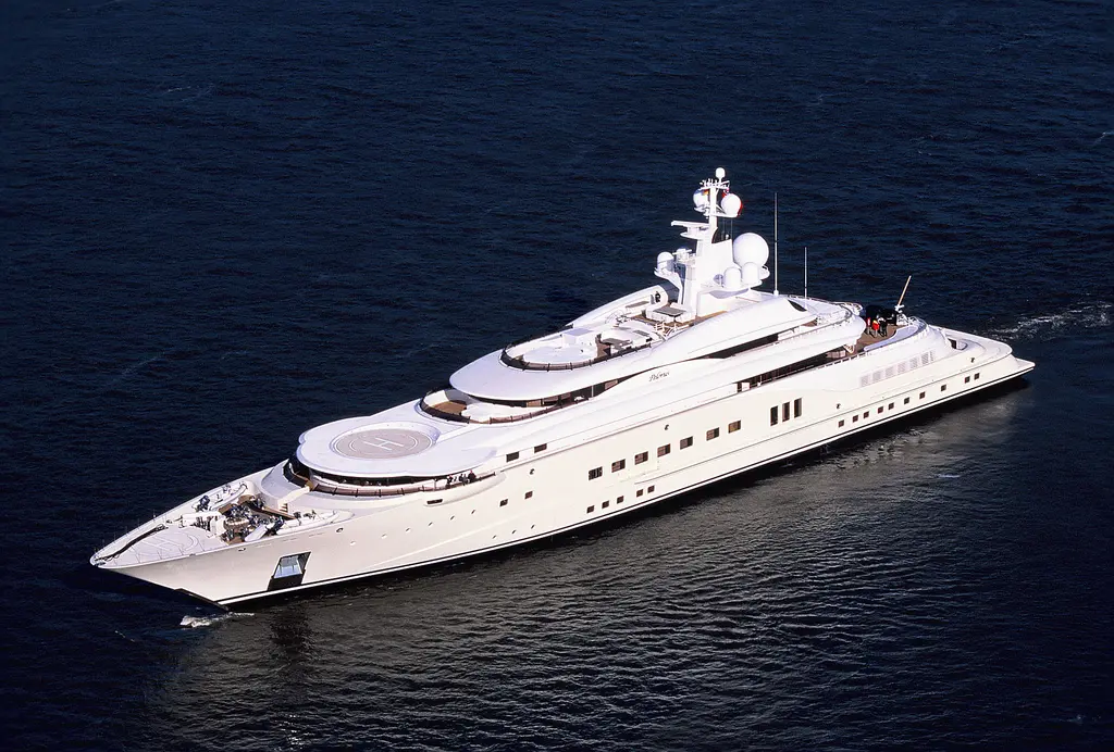 Aerial view of Pelorus under way at sea, with a helicopter pad on the foredeck