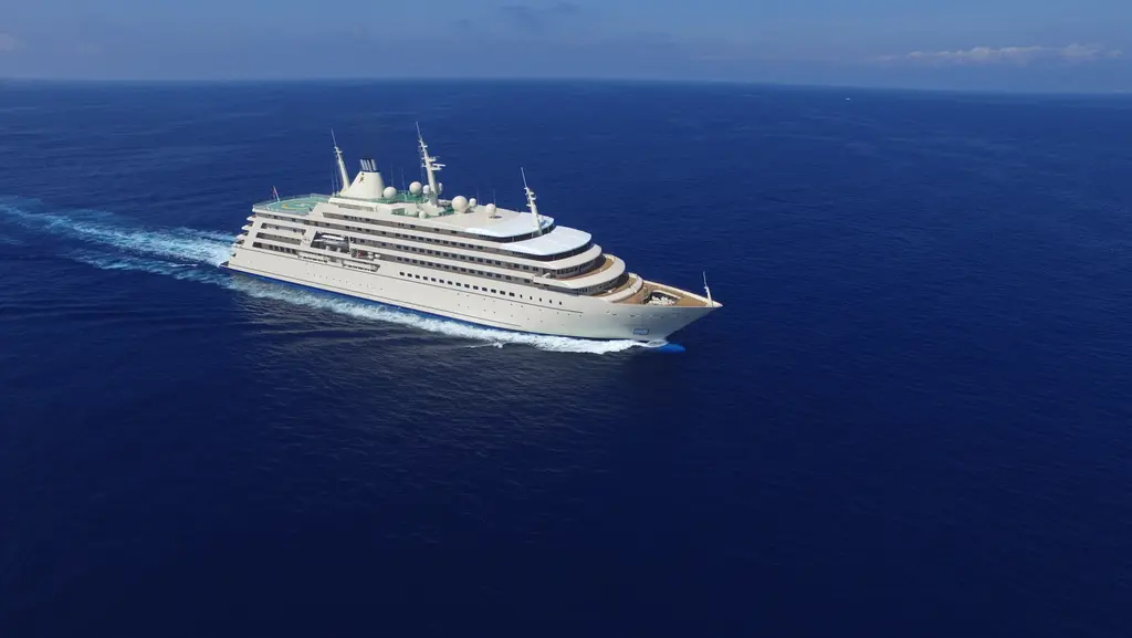 Fulk Al Salamah seen from the air off her starboard bow, cruising on open water